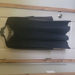 Maurices large black long sleeve dress with lace design on back. 81% polyester,